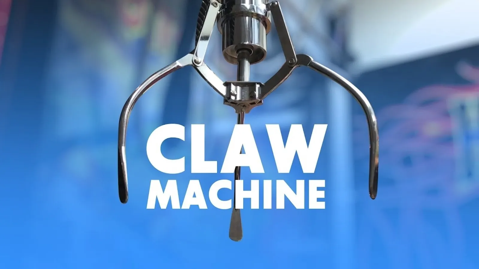 Close-up of a claw in an arcade claw machine